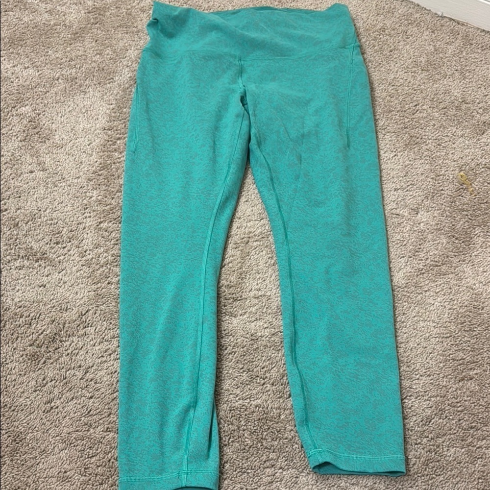 Lululemon Athletica Green Leggings with Wide Waistband and Sleek Finish
